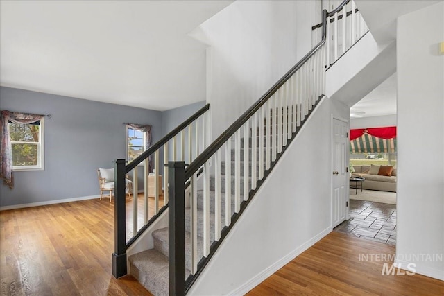 2021 W Ardell Rd, Kuna, ID 83634 - stairs featuring plenty of natural light, baseboards, and wood finished floors