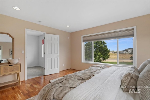 2021 W Ardell Rd, Kuna, ID 83634 - bedroom with wood finished floors and recessed lighting