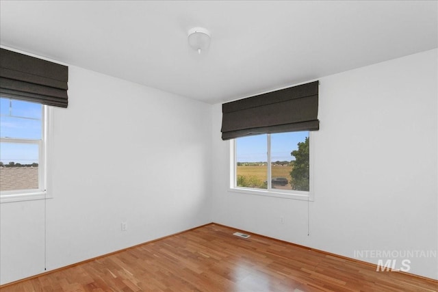 2021 W Ardell Rd, Kuna, ID 83634 - empty room with wood finished floors