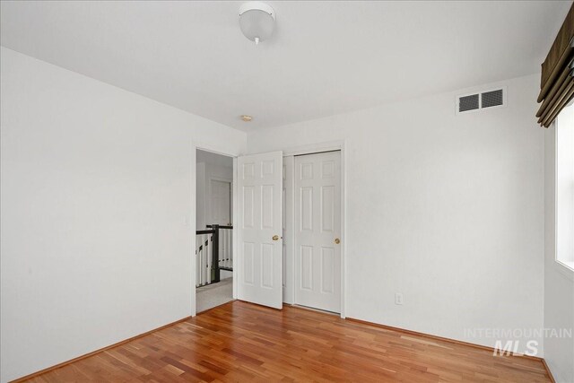 2021 W Ardell Rd, Kuna, ID 83634 - unfurnished bedroom with wood finished floors and a closet