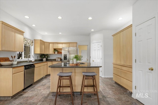 2021 W Ardell Rd, Kuna, ID 83634 - kitchen featuring light brown cabinets, stainless steel appliances, a sink, stone tile flooring, and recessed lighting