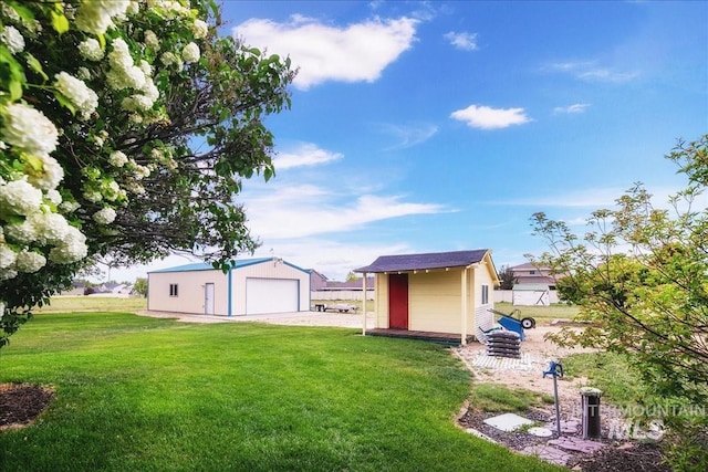 2021 W Ardell Rd, Kuna, ID 83634 - view of grassy yard with an outdoor structure and a garage