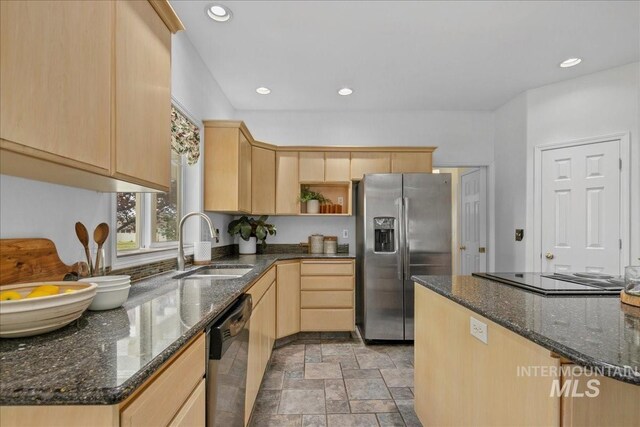 2021 W Ardell Rd, Kuna, ID 83634 - kitchen with appliances with stainless steel finishes, light brown cabinetry, a sink, stone finish flooring, and recessed lighting