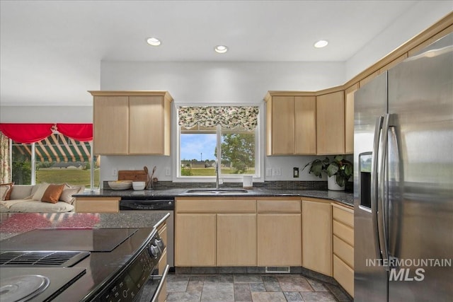 2021 W Ardell Rd, Kuna, ID 83634 - kitchen with appliances with stainless steel finishes, light brown cabinetry, a sink, and recessed lighting