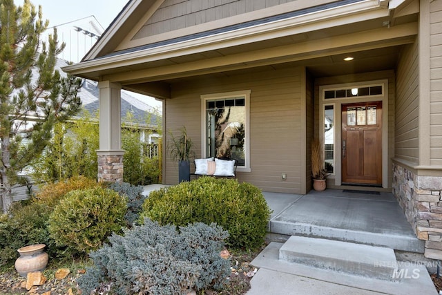 entrance to property with a porch