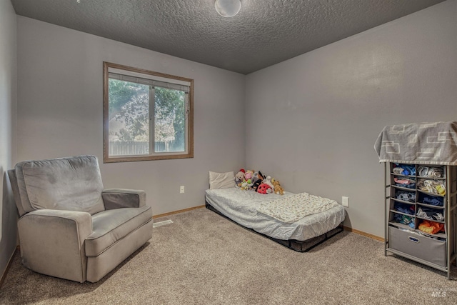 2209 S Plateau Dr, Nampa, ID 83686 - bedroom featuring carpet flooring and a textured ceiling