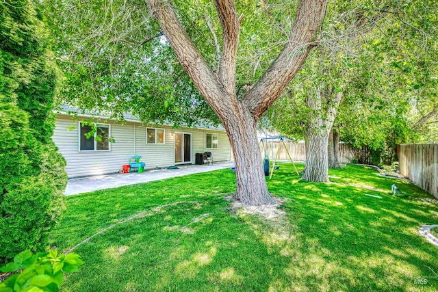2209 S Plateau Dr, Nampa, ID 83686 - fenced backyard featuring a patio