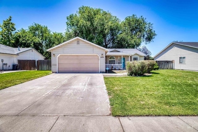 2209 S Plateau Dr, Nampa, ID 83686 - ranch-style house featuring an attached garage, concrete driveway, and a porch