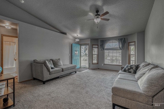 2209 S Plateau Dr, Nampa, ID 83686 - living area featuring a textured ceiling, carpet flooring, and ceiling fan
