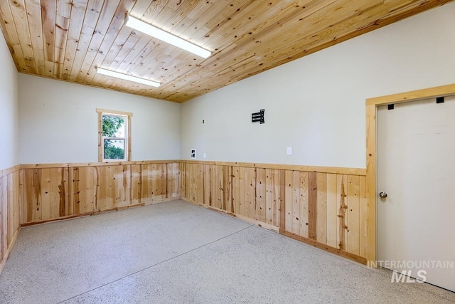 8315 Elk Ridge Ln, Middleton, ID 83644 - empty room with wainscoting, wooden walls, and wooden ceiling