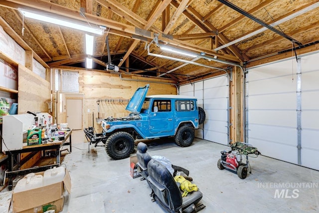8315 Elk Ridge Ln, Middleton, ID 83644 - garage featuring a garage door opener