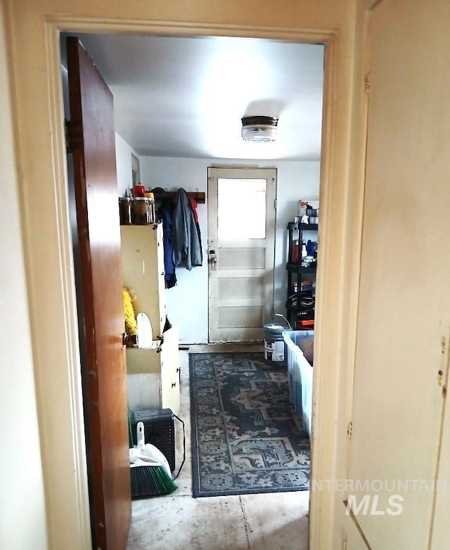 606 24th St, Lewiston, ID 83501 - hallway featuring unfinished concrete flooring