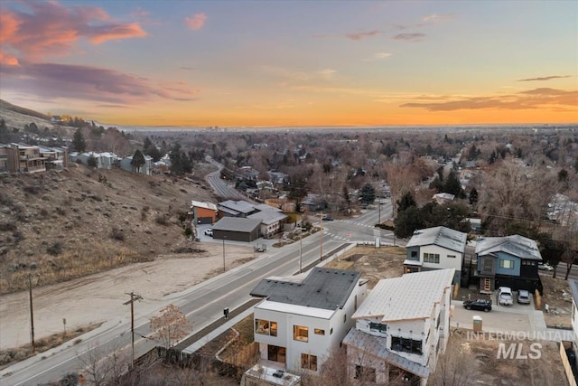 birds eye view of property with a residential view