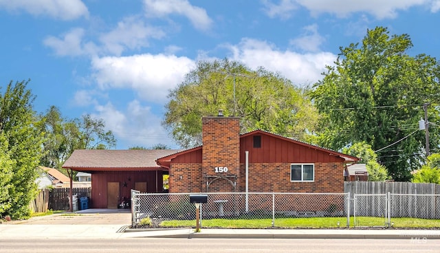 150 N 18 E, Mountain Home, ID 83647 - ranch-style home with a chimney, driveway, and brick siding