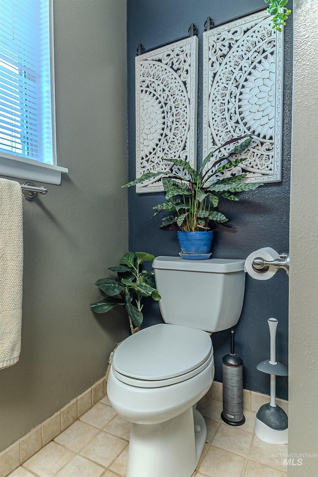 150 N 18 E, Mountain Home, ID 83647 - half bath with baseboards, toilet, and tile patterned flooring