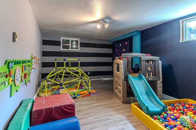 150 N 18 E, Mountain Home, ID 83647 - game room with wood finished floors