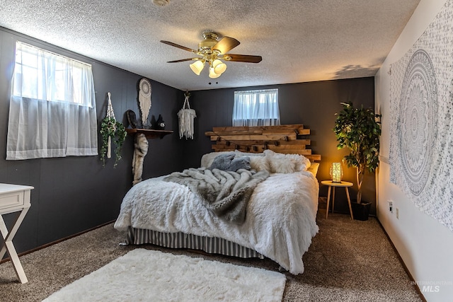 150 N 18 E, Mountain Home, ID 83647 - carpeted bedroom with a textured ceiling and a ceiling fan