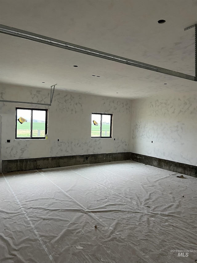 spare room featuring plenty of natural light