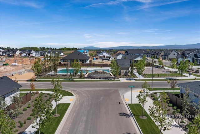 bird's eye view featuring a mountain view and a residential view