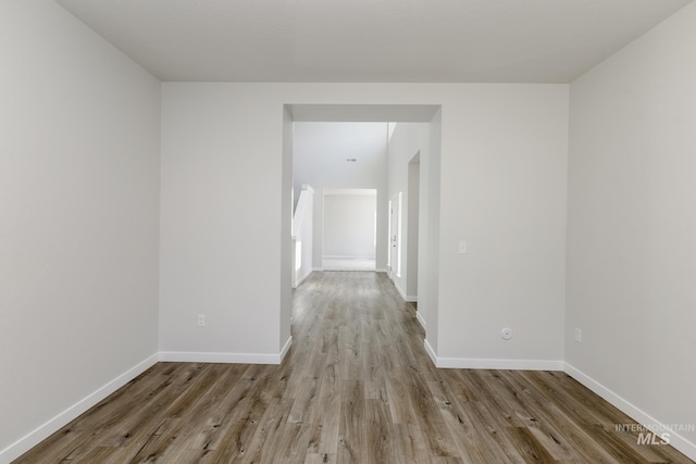 8592 N Ferris Ave, Boise, ID 83714 - spare room with wood finished floors and baseboards