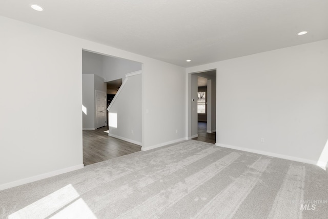 8592 N Ferris Ave, Boise, ID 83714 - unfurnished room with carpet flooring, baseboards, and recessed lighting