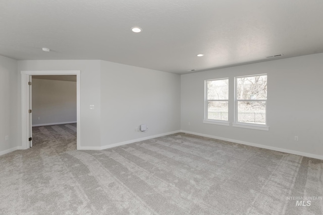 8592 N Ferris Ave, Boise, ID 83714 - unfurnished room with light colored carpet, baseboards, and recessed lighting