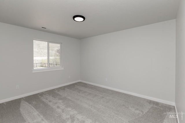 8592 N Ferris Ave, Boise, ID 83714 - carpeted empty room featuring baseboards