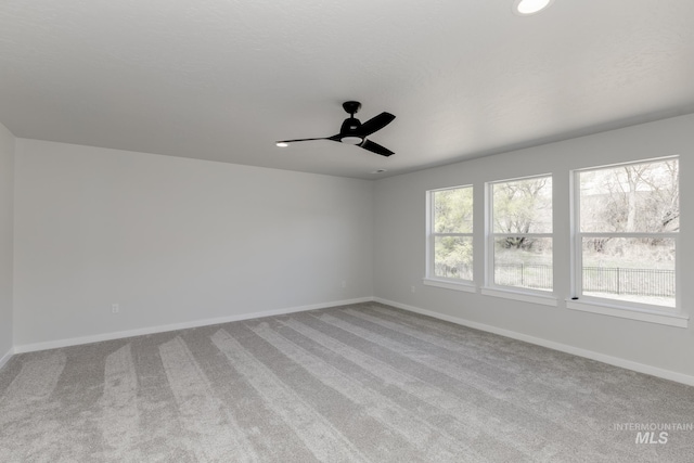 8592 N Ferris Ave, Boise, ID 83714 - unfurnished room featuring carpet floors, baseboards, and ceiling fan