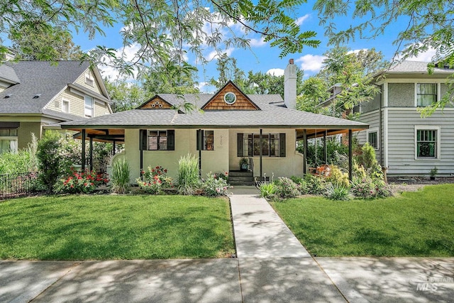 920 W Fort St, Boise, ID 83702 - view of front of property featuring a chimney, roof with shingles, a front lawn, and stucco siding