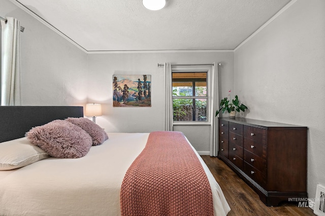 920 W Fort St, Boise, ID 83702 - bedroom featuring dark wood-type flooring, a textured ceiling, ornamental molding, and baseboards
