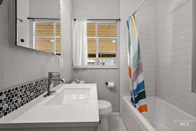 920 W Fort St, Boise, ID 83702 - bathroom with vanity, toilet, tile patterned flooring, and shower / tub combo with curtain