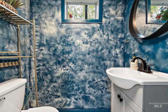 920 W Fort St, Boise, ID 83702 - bathroom with toilet, wallpapered walls, and vanity