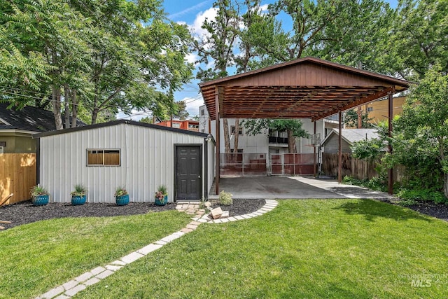 920 W Fort St, Boise, ID 83702 - view of yard with a carport and an outdoor structure