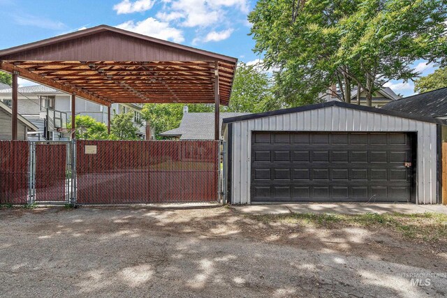 920 W Fort St, Boise, ID 83702 - detached garage with a gate and a detached carport