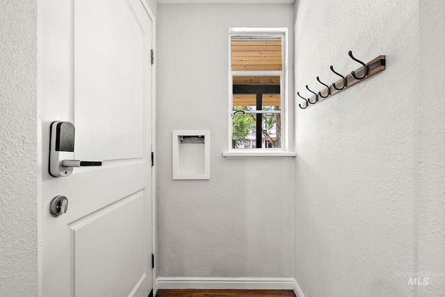 920 W Fort St, Boise, ID 83702 - doorway to outside with baseboards, a textured wall, and wood finished floors