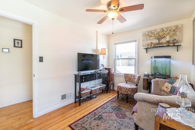 702 S Opal St, Boise, ID 83705 - living room featuring wood finished floors, ceiling fan, and baseboards
