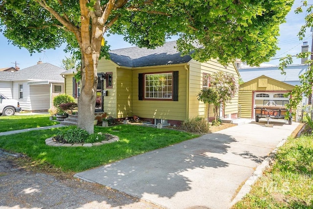 702 S Opal St, Boise, ID 83705 - view of front of property with a front yard and a shingled roof