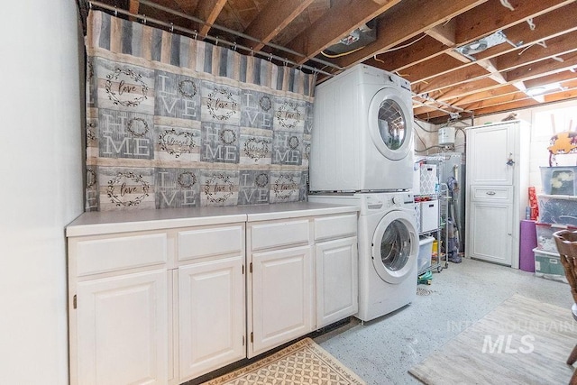 702 S Opal St, Boise, ID 83705 - washroom featuring stacked washer / dryer and water heater
