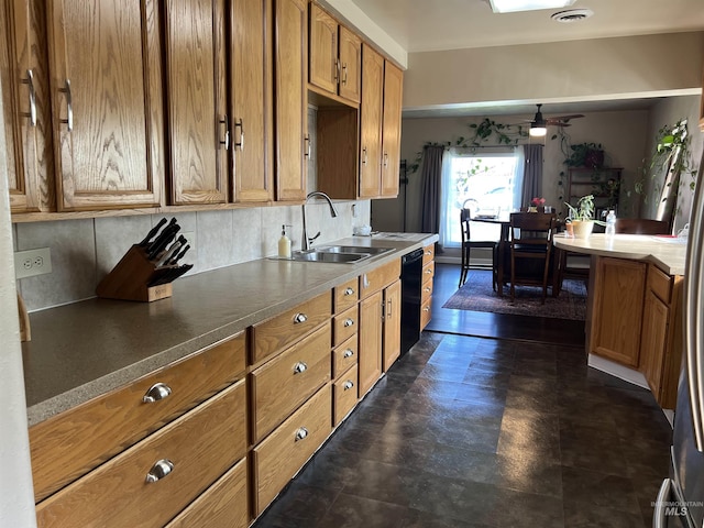 140 3rd St, Grand View, ID 83624 - kitchen featuring ceiling fan, brown cabinetry, tasteful backsplash, black dishwasher, and a sink