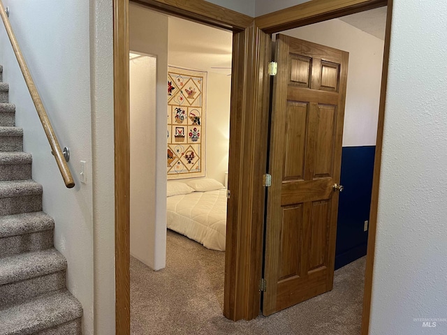 140 3rd St, Grand View, ID 83624 - corridor featuring stairs and carpet floors