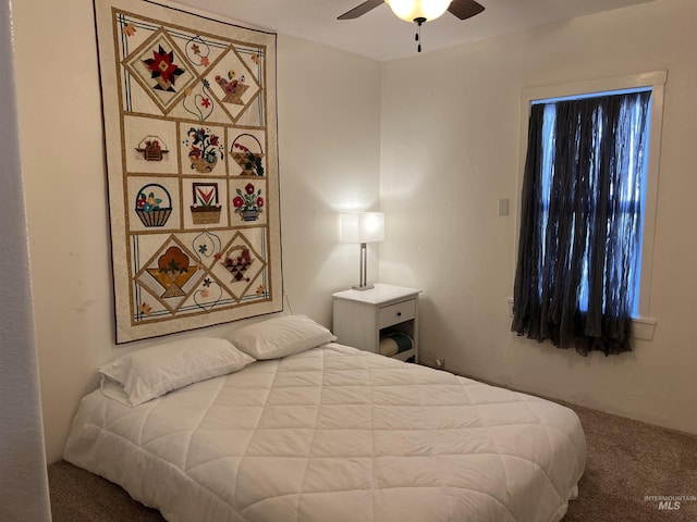 140 3rd St, Grand View, ID 83624 - carpeted bedroom with a ceiling fan
