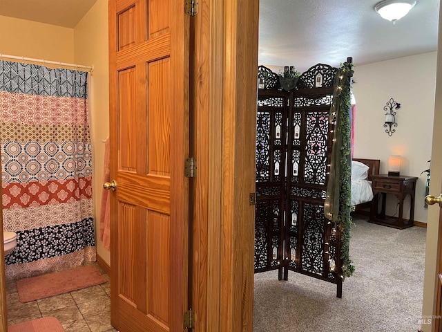 140 3rd St, Grand View, ID 83624 - corridor with carpet floors and baseboards