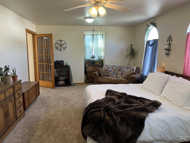 140 3rd St, Grand View, ID 83624 - bedroom with light carpet and a ceiling fan