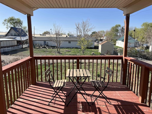 140 3rd St, Grand View, ID 83624 - wooden terrace featuring a yard and a residential view