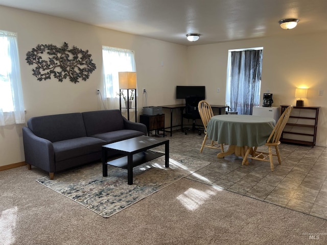 140 3rd St, Grand View, ID 83624 - carpeted living room featuring baseboards