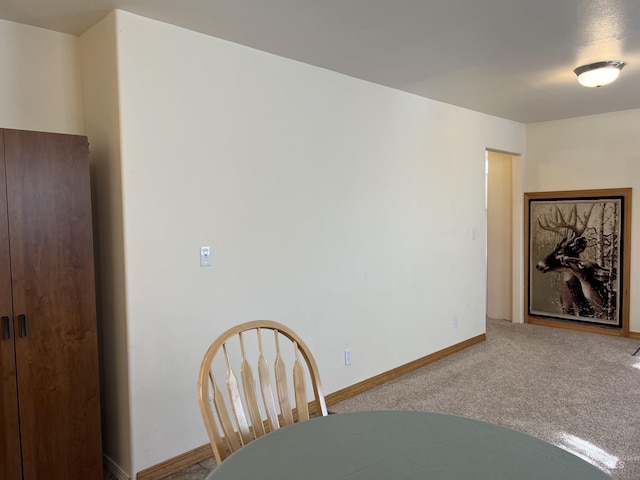 140 3rd St, Grand View, ID 83624 - carpeted dining space with baseboards