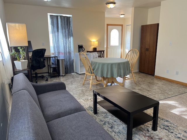140 3rd St, Grand View, ID 83624 - living room featuring baseboards