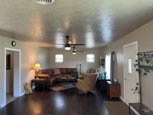 140 3rd St, Grand View, ID 83624 - living area featuring baseboards, a textured ceiling, a ceiling fan, visible vents, and wood finished floors