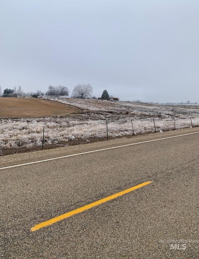 view of street featuring a rural view