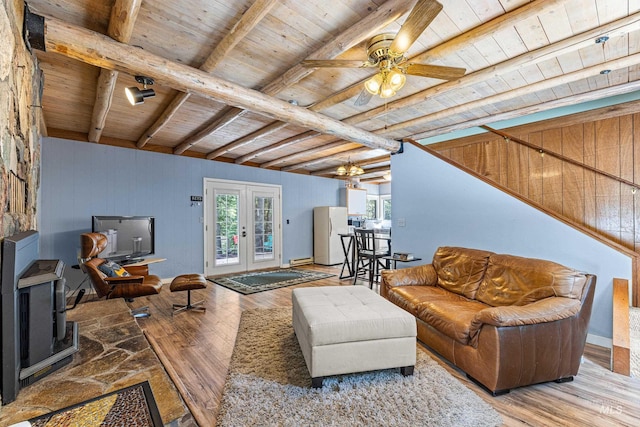 995 Cedar Crest Dr, Mccall, ID 83638 - living area with wood ceiling, french doors, baseboard heating, and wood finished floors